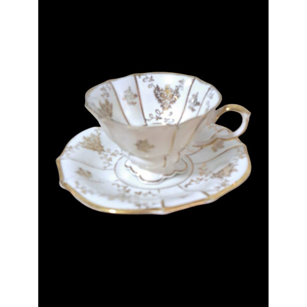 LINDNER Kueps Bavaria Demitasse Floral Footed Gold Gilt Porcelain Cup/Saucer